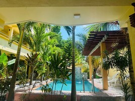 Deluxe Double Room, Pool View | Minibar, desk, soundproofing, iron/ironing board