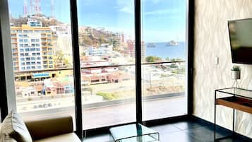 Deluxe Apartment, Balcony, Partial Sea View | Living area