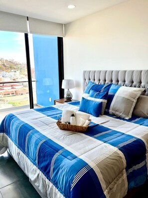 Deluxe Apartment, Balcony, Partial Sea View | 2 bedrooms, blackout drapes, iron/ironing board, free WiFi - Boca de cielo Apartments (Mazatlán)