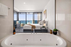 Shower, jetted tub, hair dryer, towels