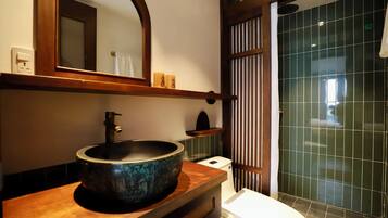 Separate bathtub and shower, hair dryer, slippers, towels