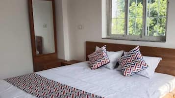 Habitación Deluxe, vistas al jardín | Sábanas de algodón egipcio y ropa de cama de alta calidad