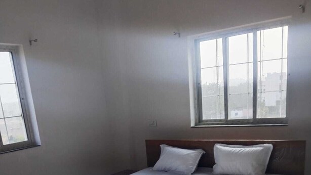 Deluxe Oda, Bahçe Manzaralı | Mısır pamuklu çarşaf takımı, kaliteli yatak takımı, kuştüyü yorgan