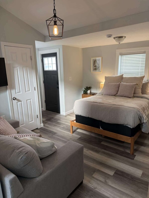 1 habitación, tabla de planchar con plancha, cuna de viaje y wifi 