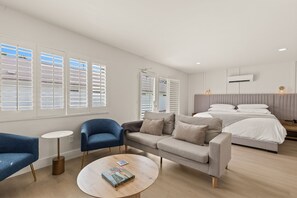 Superior Double Room, 1 King Bed, Private Bathroom, Pool View | Living area | 42-inch Smart TV with digital channels - Casa Oliver Hotel & Resort - A Gay Men's Resort (Palm Springs)