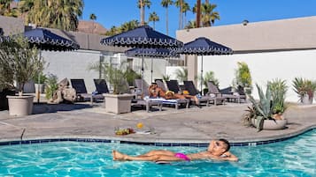 Outdoor pool, pool umbrellas, pool loungers