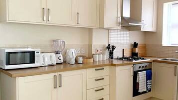 Microwave, oven, cookware/dishes/utensils