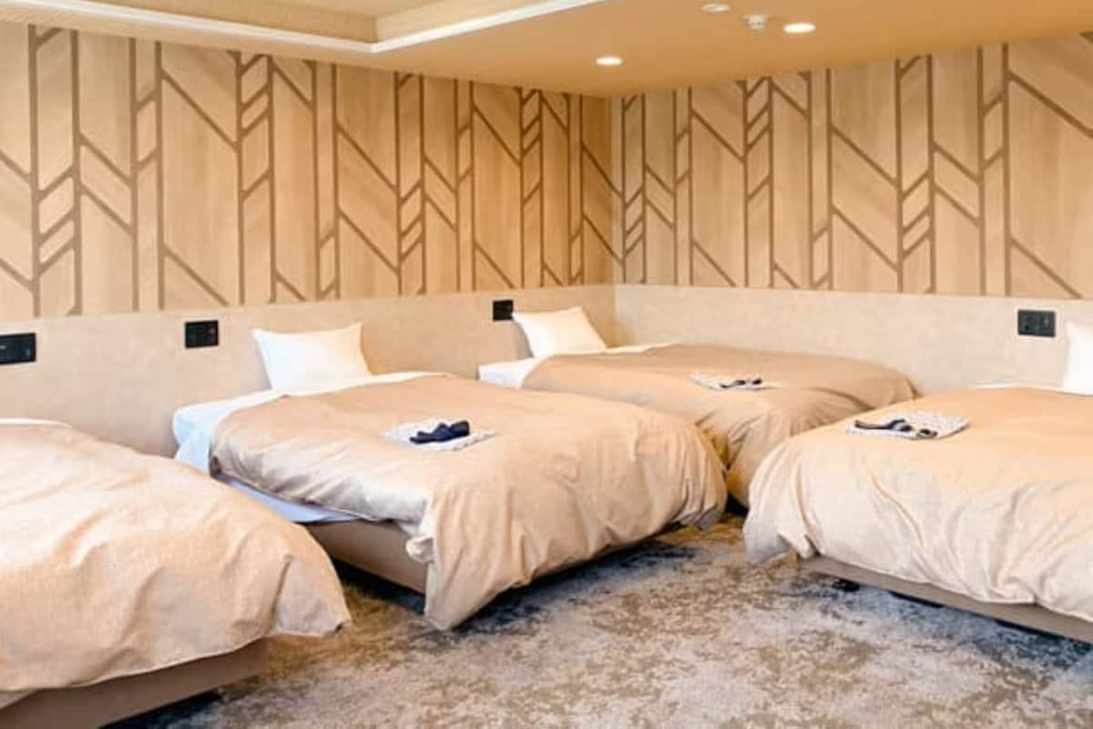 Kamar Keluarga, Bebas Asap Rokok | Wi-Fi gratis dan seprai linen