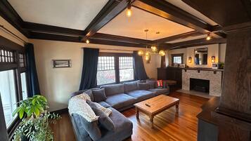 Smart TV, fireplace, books, printers