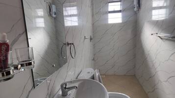 Hair dryer, towels, soap, shampoo