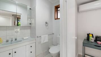 Hair dryer, towels, soap, shampoo