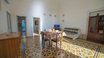 Family House, Multiple Bedrooms (Marisole House With Sea View) | Living area | 21-inch flat-screen TV with digital channels