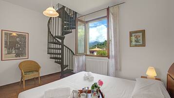 Rumah Keluarga, 4 kamar tidur, 2 kamar mandi, tepi gunung (Casa Virginia) | 4 kamar tidur, setrika/meja setrika, Wi-Fi gratis, dan seprai linen