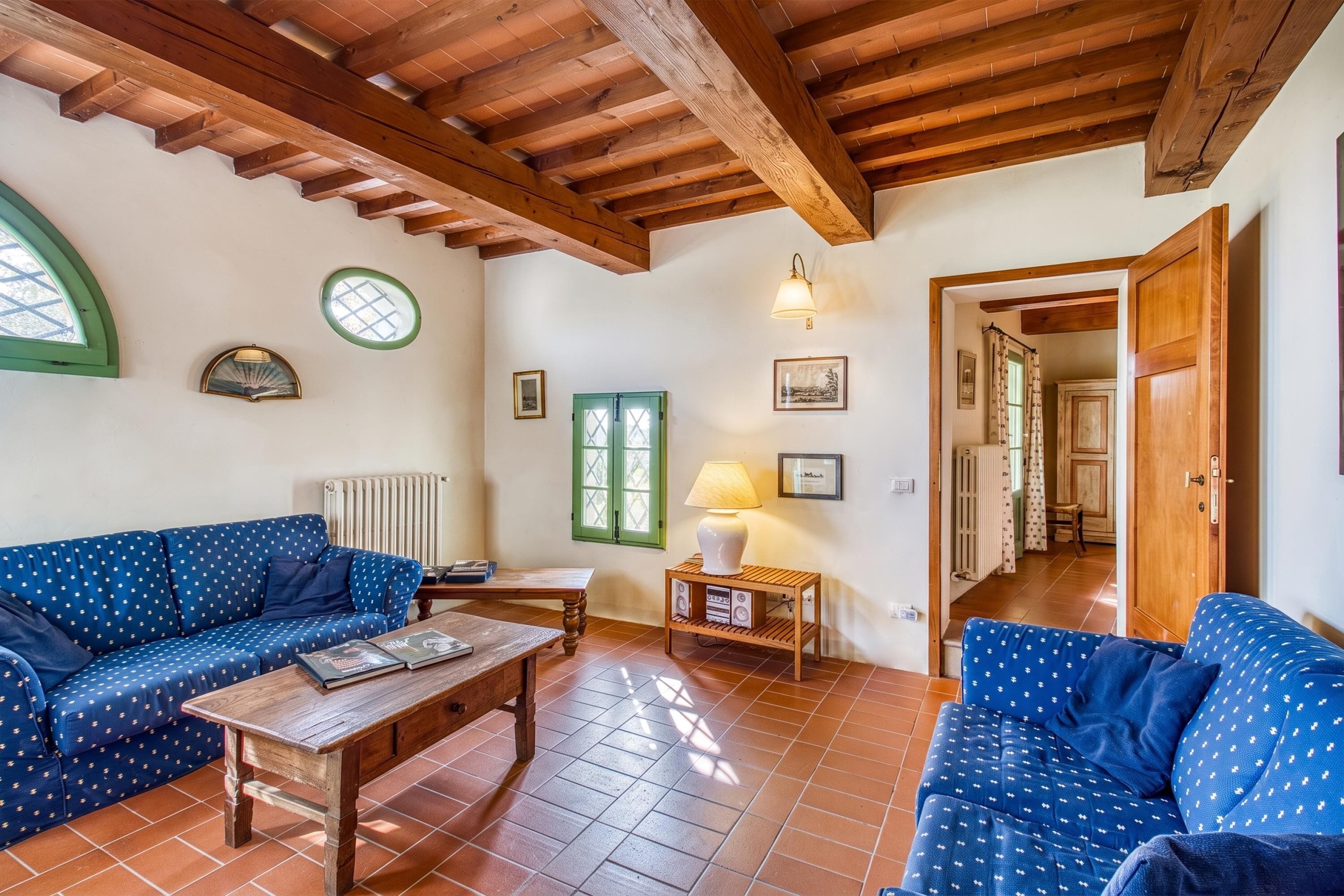 Family House, Multiple Bedrooms, Fireplace, Mountainside (Villa Salivolpe Chianti Views &) | Living area | Flat-screen TV