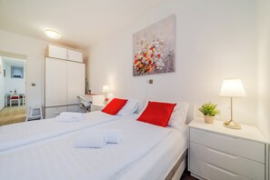 Laptop workspace, iron/ironing board, free WiFi, bed sheets