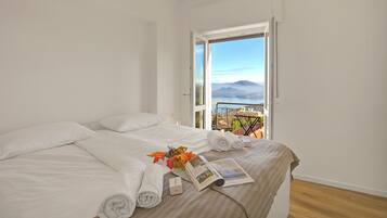 Family Apartment, Multiple Bedrooms, Mountainside (Luce Lake View on Stresa Hill) | 3 bedrooms, free WiFi, bed sheets