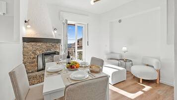 Family Apartment, 2 Bedrooms, Balcony, Mountainside (Quadrifoglio Stresa Hill with A/C and) | Dining