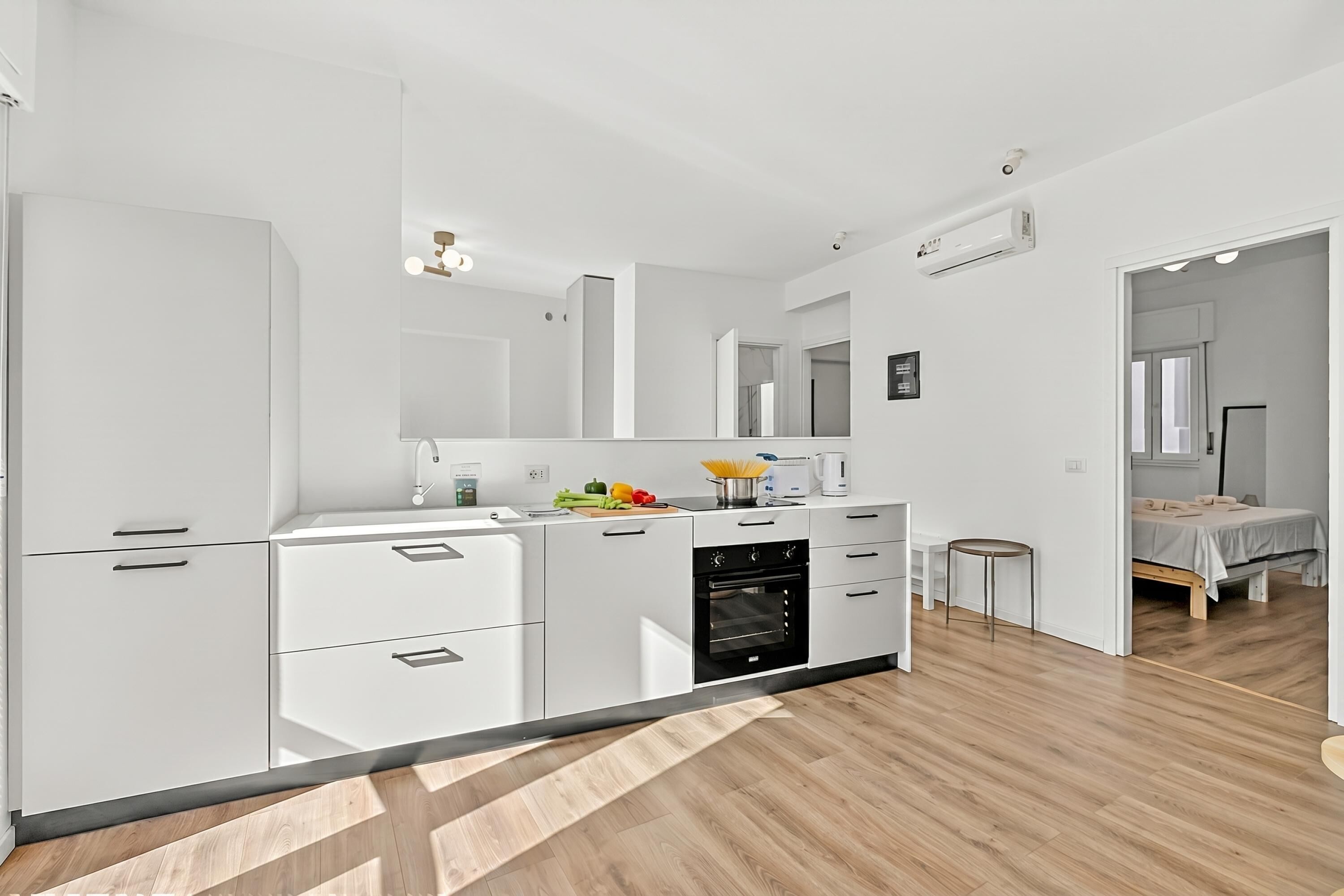 Family Apartment, 2 Bedrooms, Balcony, Mountainside (Quadrifoglio Stresa Hill with A/C and) | Private kitchen | Fridge, microwave, oven, stovetop