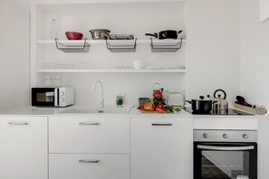 Family Apartment, Multiple Bedrooms (Nova Lake View Stresa Hill) | Private kitchen | Fridge, microwave, oven, stovetop - Luce Lake View on Stresa Hill (Stresa)