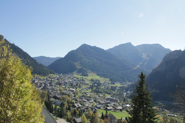 A mountainous landscape with a valley town. - Apartment in Chatel for two people (Châtel)