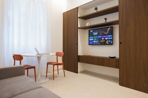 Deluxe appartement | Woonruimte | Flatscreentelevisie