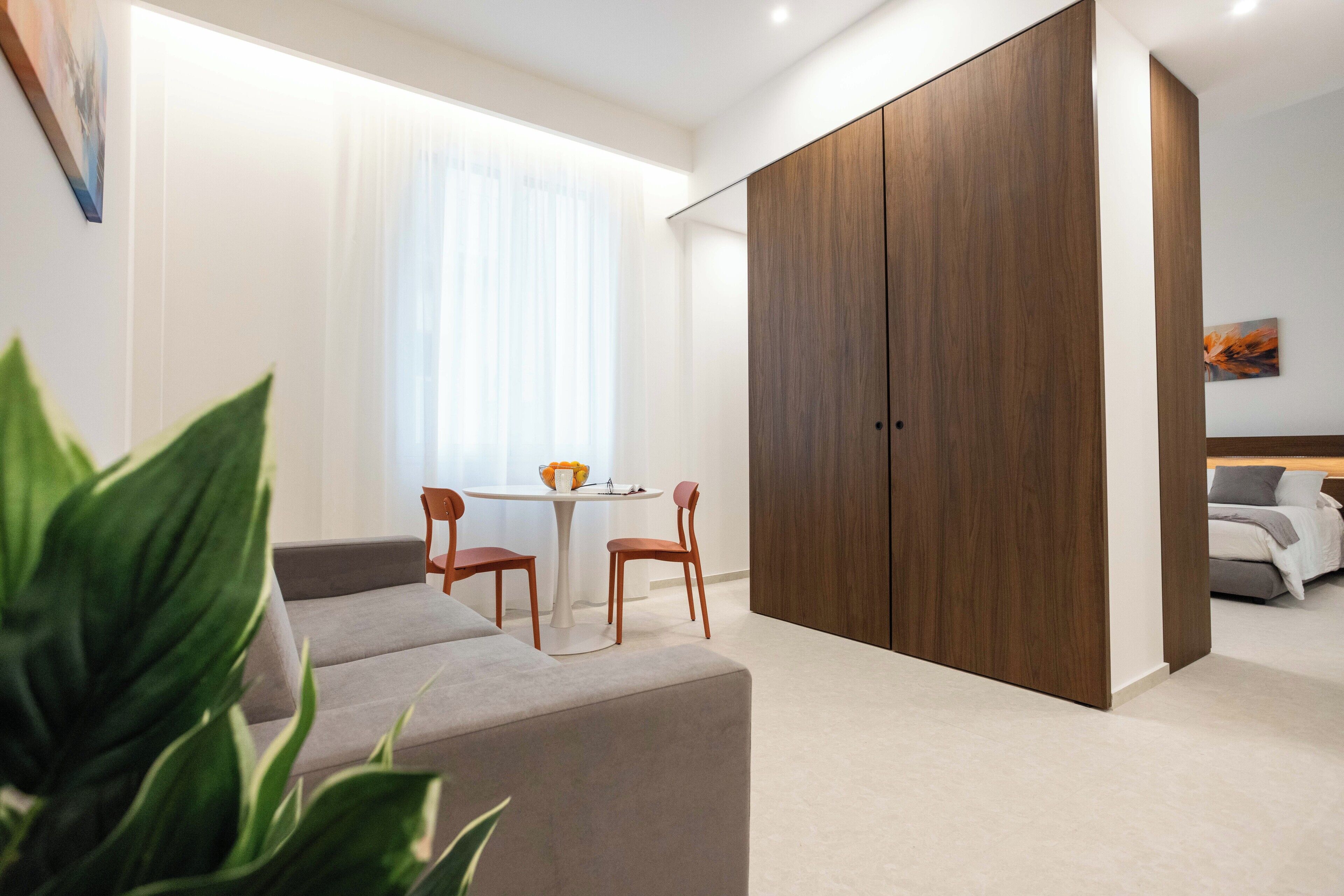 Deluxe Apartment | Living area | Flat-screen TV