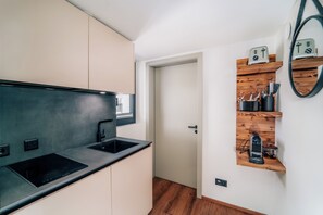 Full-size fridge, espresso maker, coffee/tea maker, electric kettle
