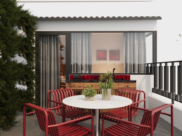 A round table with six red chairs, a white tablecloth, and a potted plant in the center. - HOME KEY Residence in Center (Hanoi)