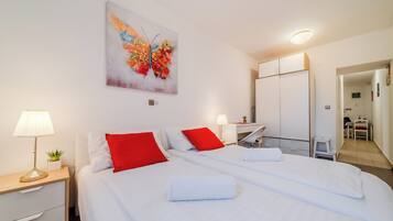 Laptop workspace, iron/ironing board, free WiFi, bed sheets