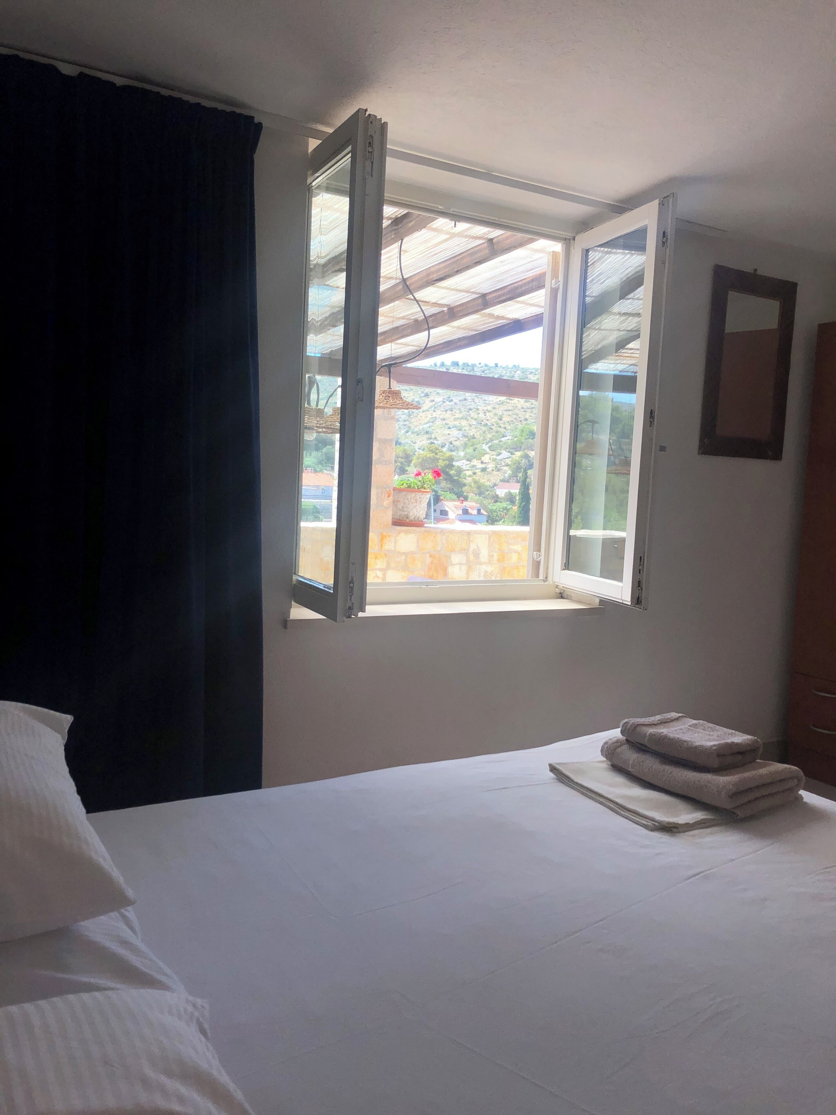 2 bedrooms, blackout curtains, iron/ironing board, free WiFi