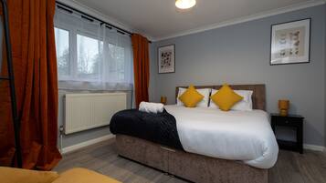 2 dormitorios, tabla de planchar con plancha, wifi gratis y ropa de cama