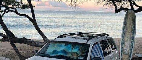 On the beach, sun loungers, beach towels