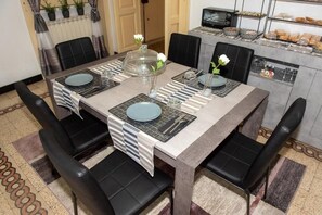 Dining - PITAGORA HOUSE, 3 bedrooms, bathroom, TV and dining room, cooking area, veranda (Taranto)