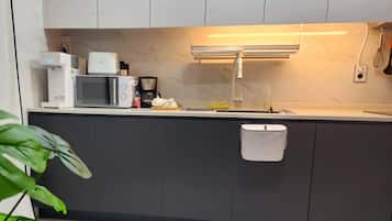 Fridge, microwave, coffee/tea maker, electric kettle