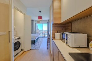 1 slaapkamer, een strijkplank/strijkijzer, wifi, beddengoed