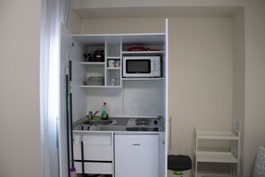 Réfrigérateur dans l'espace commun