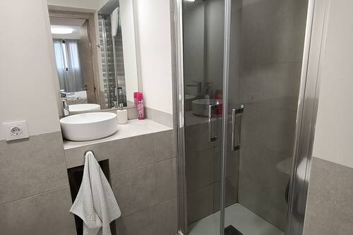 Hair dryer, towels, soap, shampoo
