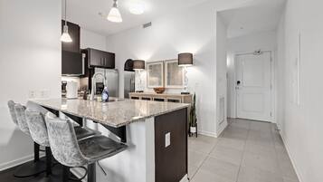 Coffee/tea maker, fridge, microwave, oven