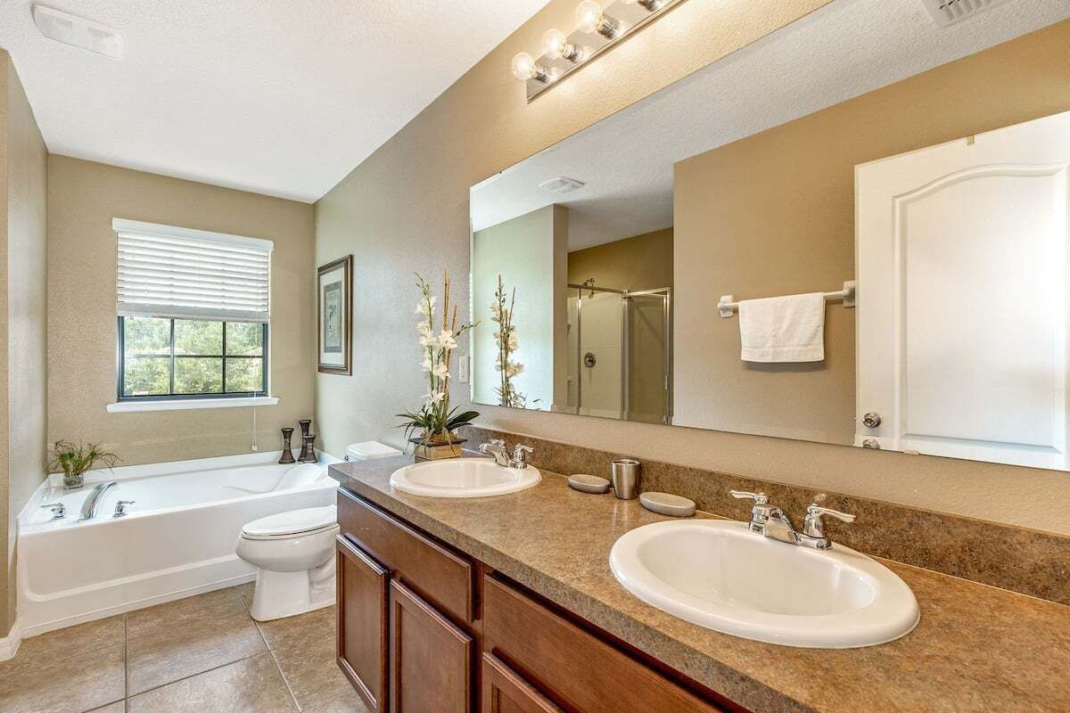 Shower, hair dryer, towels, toilet paper