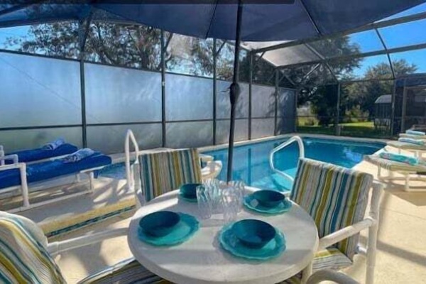 The heated pool is the perfect spot to take a refreshing dip, whether you're starting your day with an invigorating swim or lounging by the water with a cool drink in hand