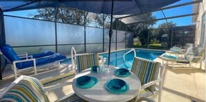 Outdoor pool, a heated pool - Disney Escape | 4BR Villa w/ Pool, Spa & Fun Games Room in Clermont (Clermont)