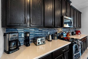 Fridge, high chair, dining tables
