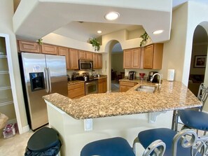 High chair, kitchen islands - Family Villa with Pool, Spa &  Close to Attractions! (Davenport)