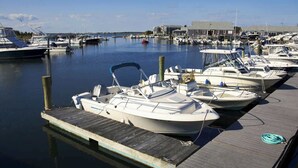 A marina with several boats docked at wooden piers. - Updated A-Frame w/ Game Room, Short Drive to Beach! (Barnstable)