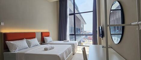 Comfort Triple Room, Balcony, Partial Ocean View | Desk, laptop workspace, iron/ironing board, free WiFi