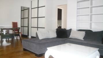 Apartment, 3 Bedrooms | Living area | Flat-screen TV