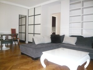 Apartment, 3 Bedrooms | Living area | Flat-screen TV
