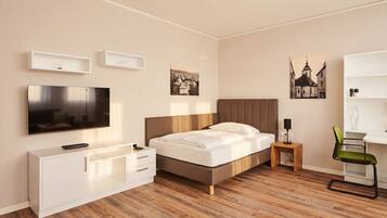 A modern bedroom with a bed, TV, bedside table, and a chair.