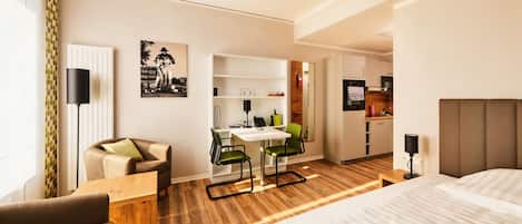 Standard Apartment | Living area | 42-inch Smart TV with satellite channels, Netflix, streaming services