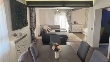 Apartment, 1 Bedroom, Accessible, Private Pool | Living room | Books